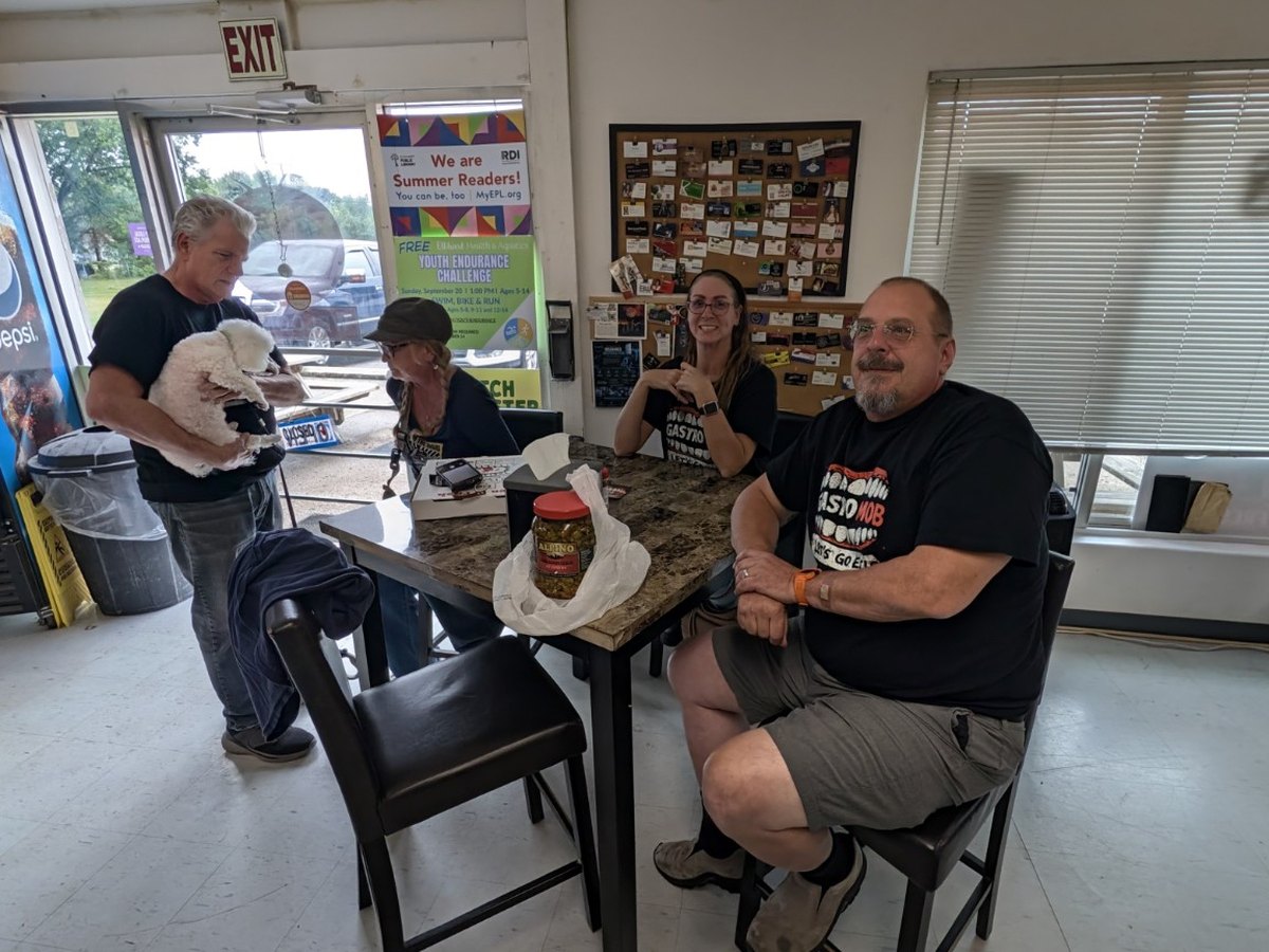 GastroMob members in group shirts with Charlie the dog at Freshieez